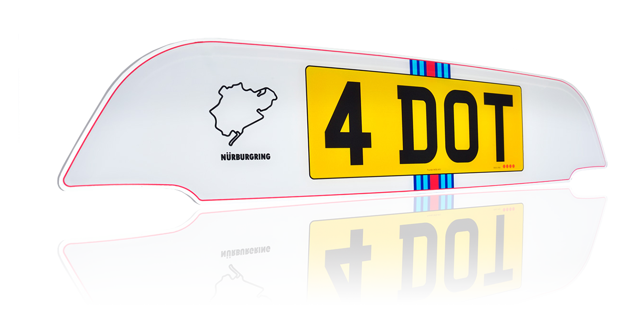 Elements of a shaped rear number plate